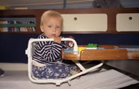 Vera in hangstoeltje.